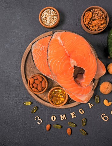 Omega-3 rich foods including salmon, avocado, nuts, and seeds for mental health