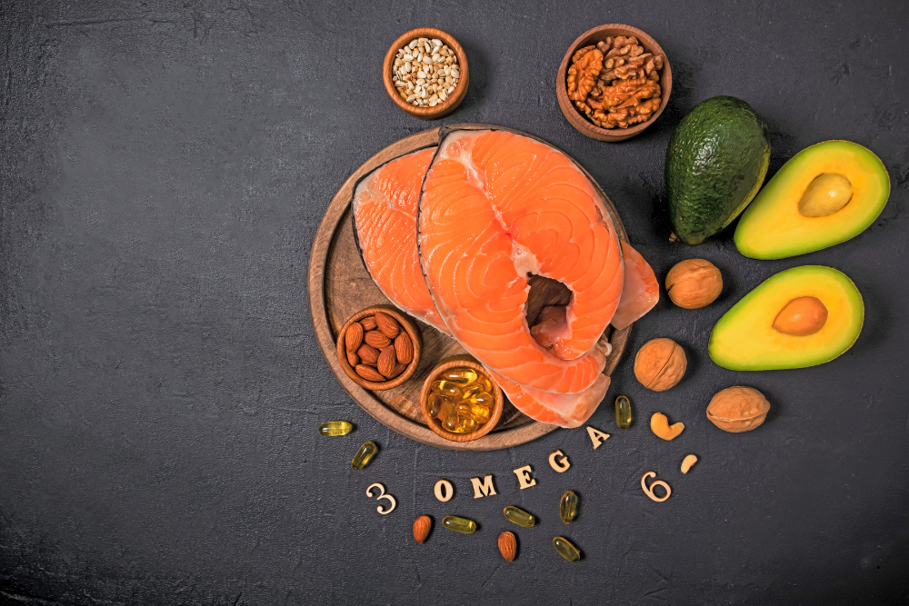 Omega-3 rich foods including salmon, avocado, nuts, and seeds for mental health